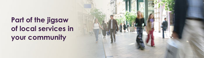 Image of a bustling street with the caption "Part of the jigsaw of local services in your community"